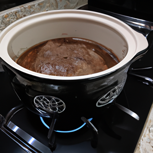 A Dutch oven on a stovetop, ready for slow cooking the steak to perfection.